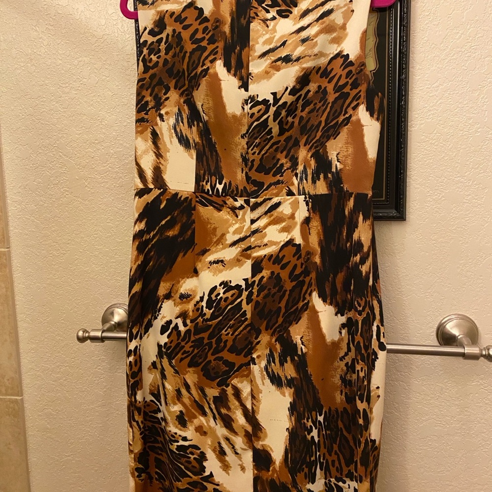 Animal print dress with gold grommets around neckline. Size 10, back zipper. NWT - Picture 4 of 4